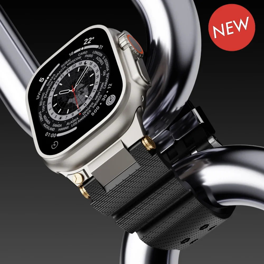Apple Watch with a new black silicone sports strap on a metallic surface, showcasing durability and style.