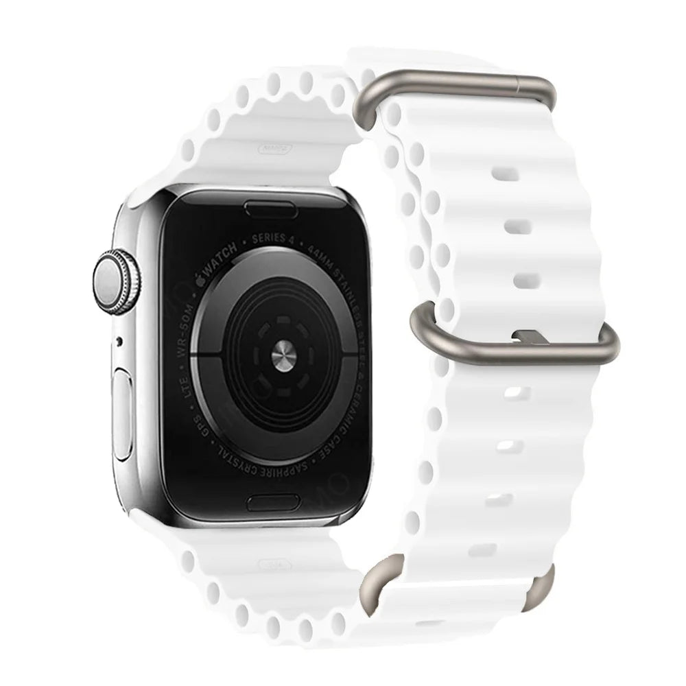 Apple Watch with white silicone strap, waterproof and breathable band perfect for active lifestyles.