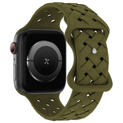 Apple Watch with olive green silicone strap, breathable design for active lifestyles and all-day comfort.
