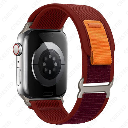 Apple Watch Trail Loop Nylon Strap in burgundy and orange, lightweight and durable for comfort and style.