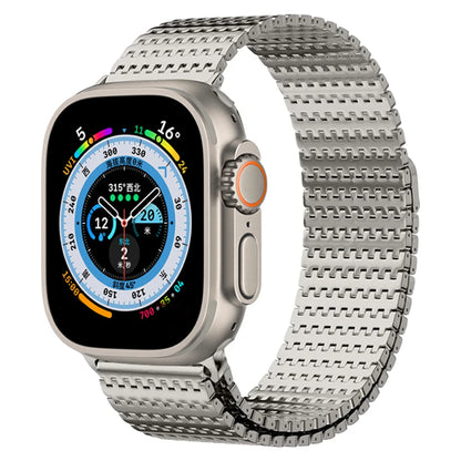 Apple Watch with stainless steel Milanese loop band featuring magnetic clasp and colorful display.