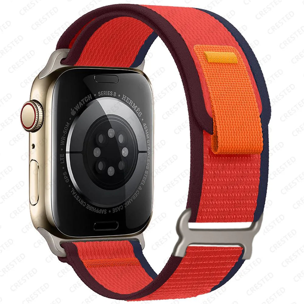 Apple Watch with Trail Loop nylon strap in vibrant colors, designed for durability and comfort during activities.