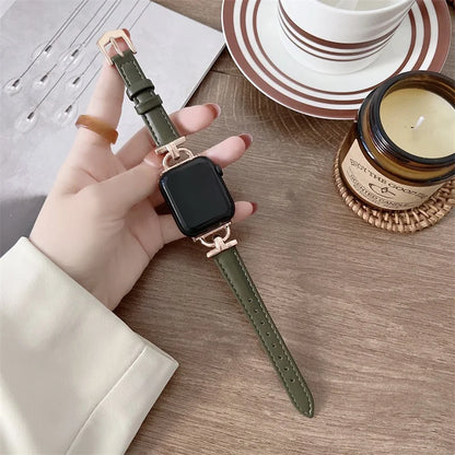 Apple Watch genuine leather strap in green showcased on a hand, combining elegance and durability for stylish smartwatch wear.