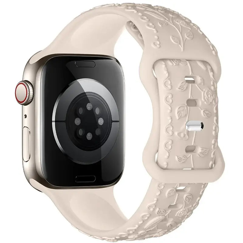 Ivory botanical silicone Apple Watch band showing fastening and rear view