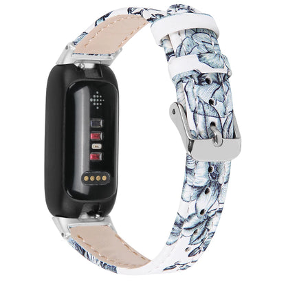 Fitbit Inspire 3 leather strap with floral design, stylish and breathable smartwatch band for all-day wear.
