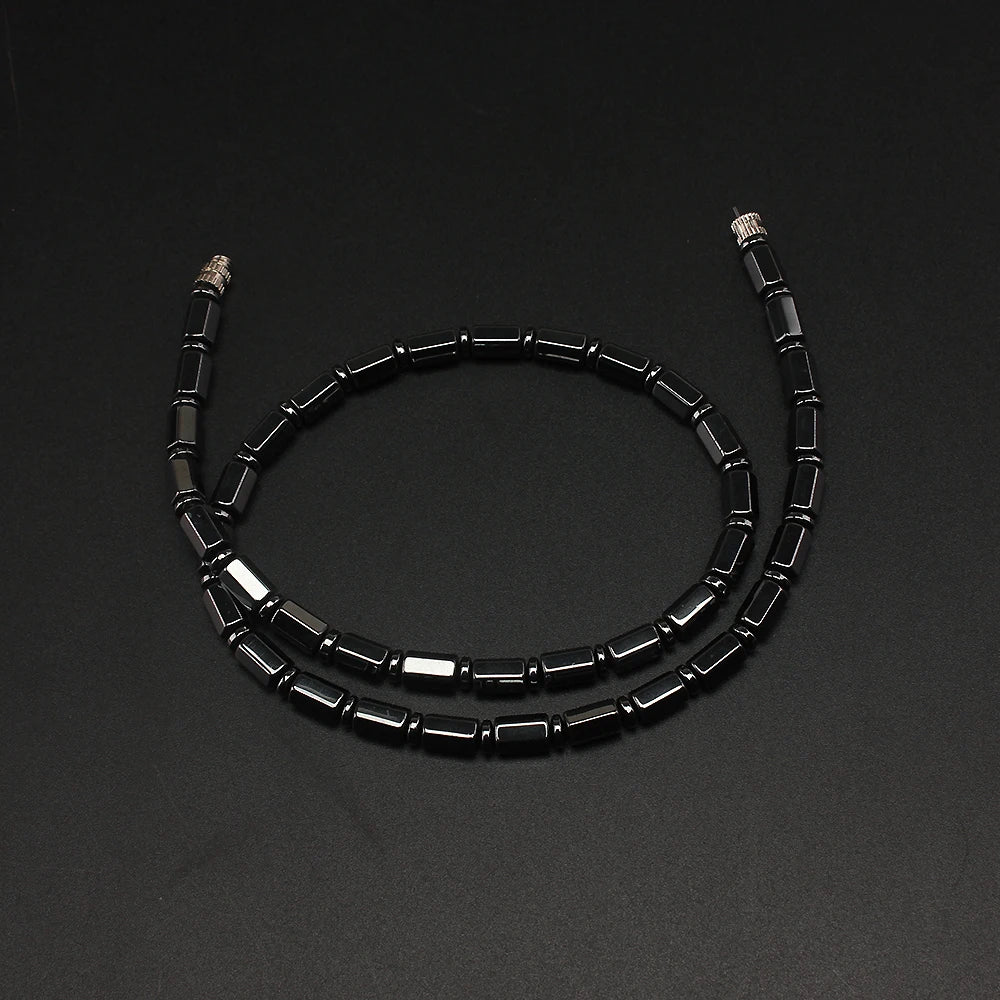 Close-up of the bamboo-shaped simulated hematite beads