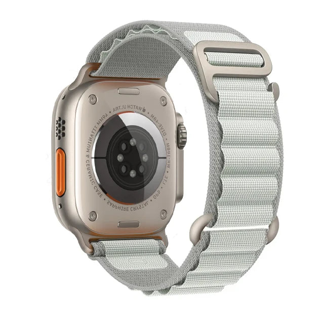 Apple Watch with Rugged Alpine Loop nylon strap showcasing adjustable design and durable construction.