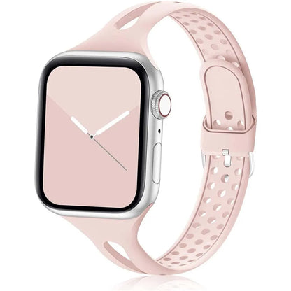 Apple Watch with soft pink silicone strap, featuring breathable design for comfort and style.