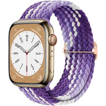 Apple Watch with braided purple and white elastic nylon strap, showcasing comfort and style for daily wear.