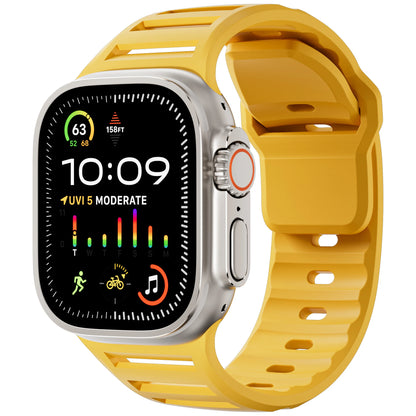 Apple Watch with yellow silicone sport strap, showcasing its flexible and waterproof design for active lifestyles.