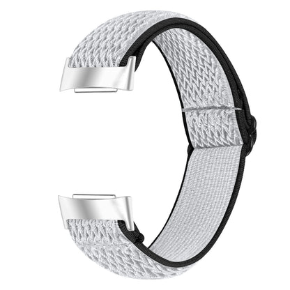 Fitbit Charge 6 nylon strap in white, elastic sport fabric for comfort and breathability, perfect smartwatch band replacement.