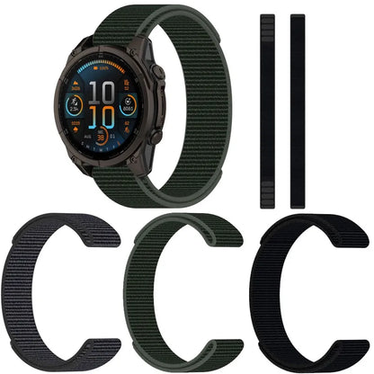 Garmin Nylon Loop Strap in black and green on smartwatch with replacement bands, showcasing breathable and durable design.