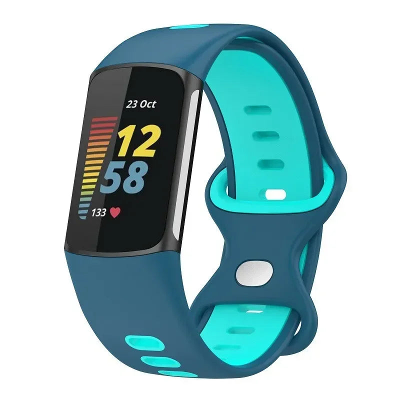 Fitbit Charge 5 smartwatch with soft silicone strap in blue and teal, ideal for comfort and style during sports.