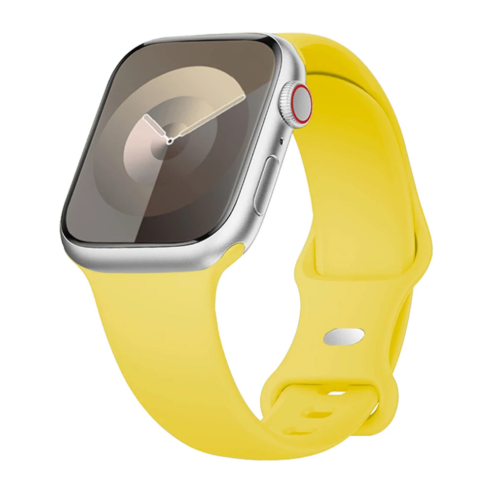 Apple Watch with yellow silicone strap, showcasing waterproof design for comfort and style during workouts.