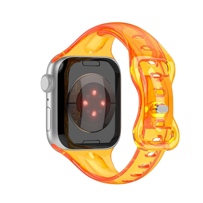 Apple Watch with a clear orange rubber strap, showcasing a sleek and flexible design for maximum comfort.