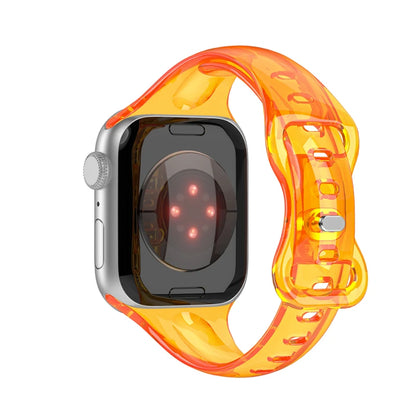 Apple Watch with a clear orange rubber strap, showcasing a sleek and flexible design for maximum comfort.