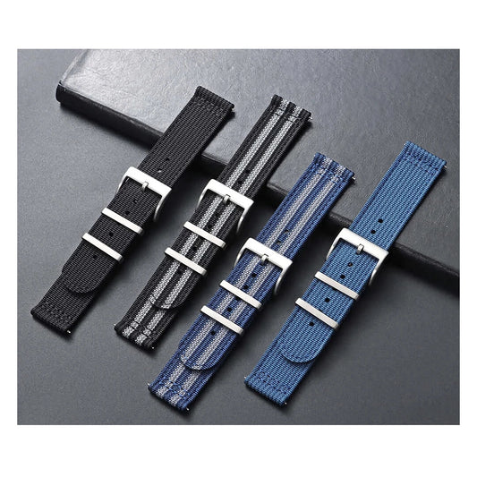 Four actual ribbed nylon bands with silver buckles and metal keepers