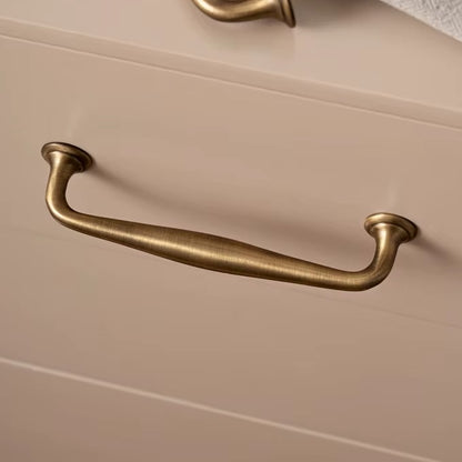 Arched solid brass cabinet pull in antique brass