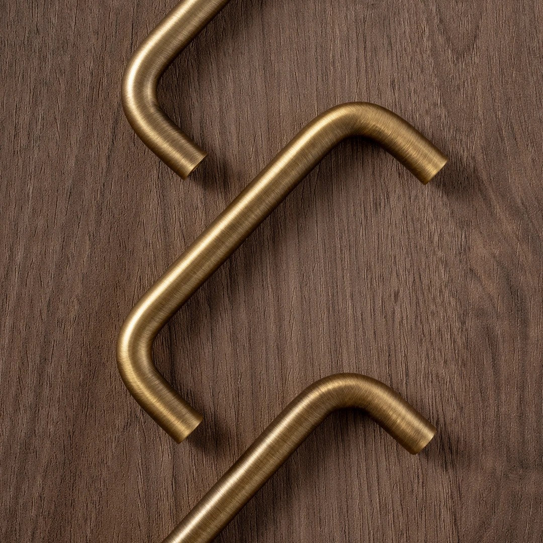 U-shaped solid brass wire cabinet pull in antique brass