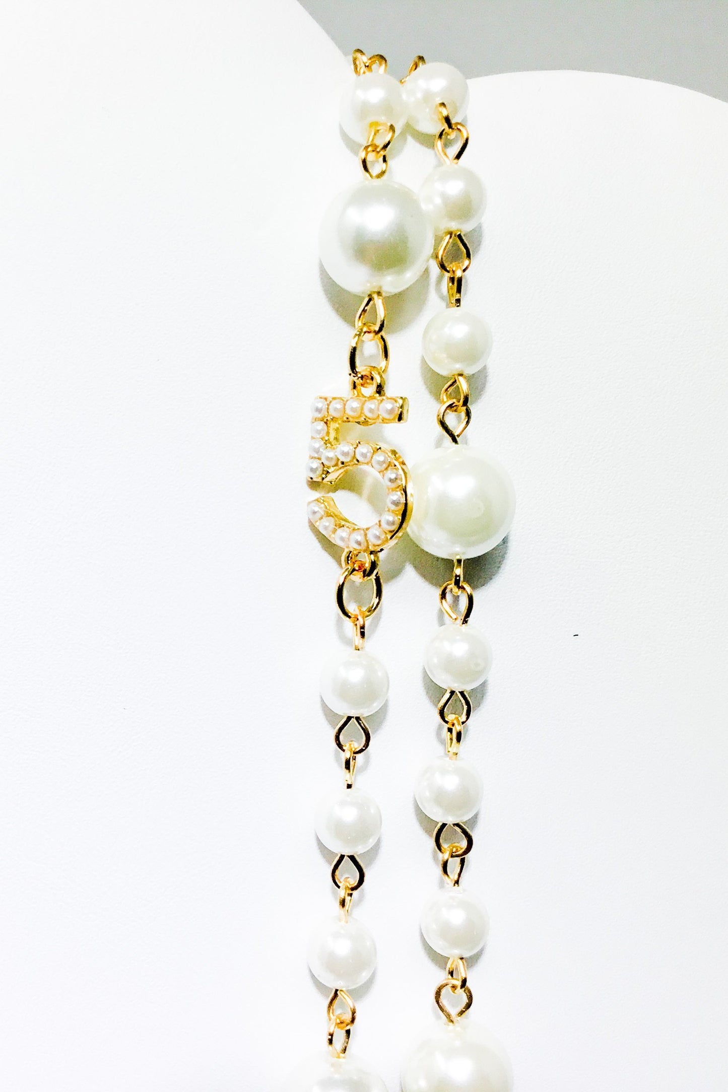 Double Strand Pearl Necklace With Gold Floral Accents by Burgundy Uranus