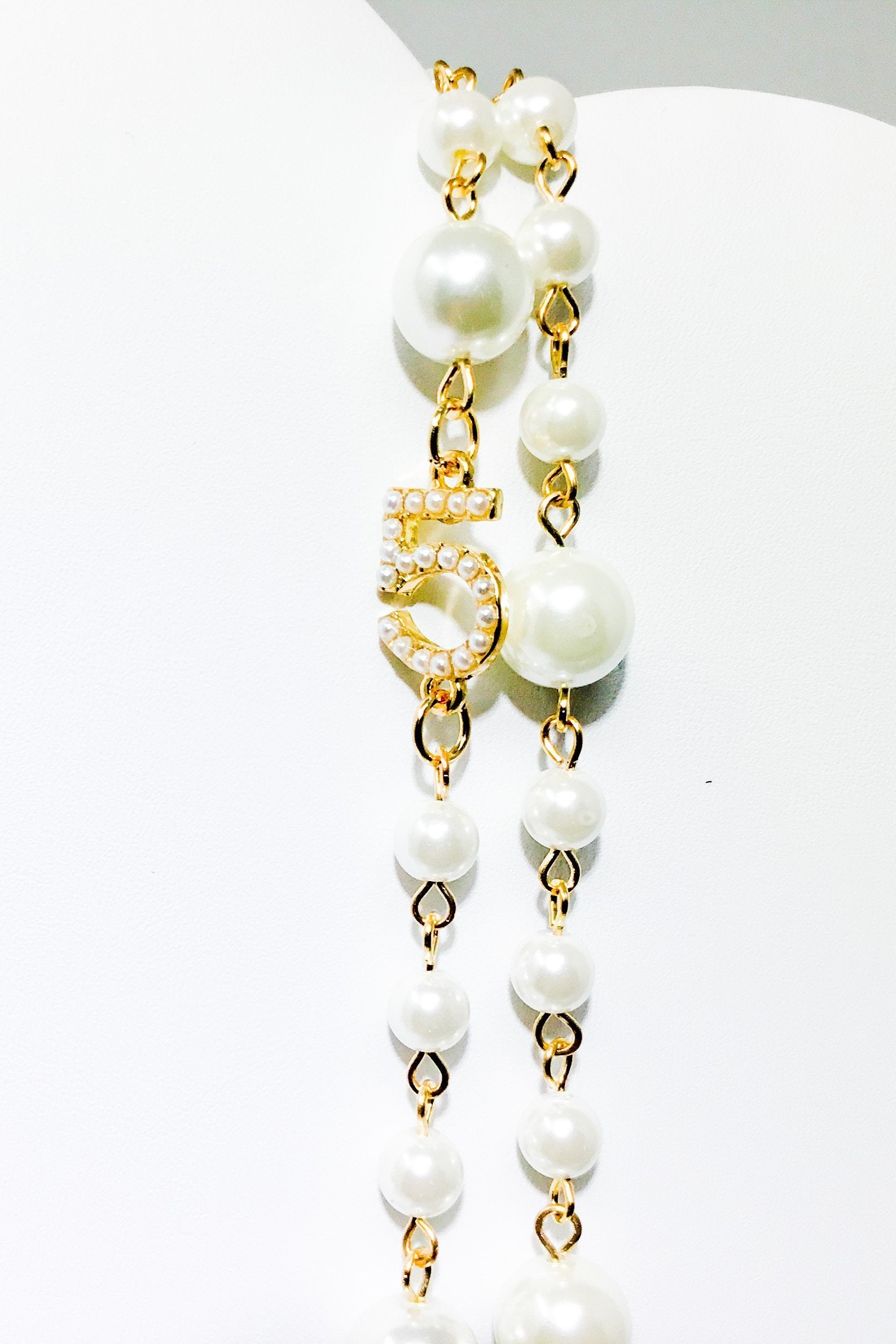 Double Strand Pearl Necklace With Gold Floral Accents by Burgundy Uranus
