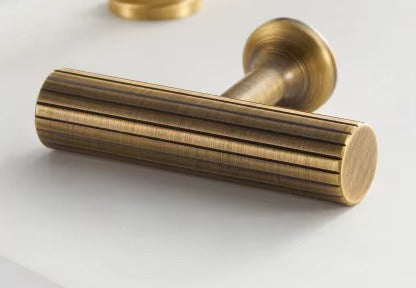 Fluted solid brass T-bar cabinet knob in antique brass
