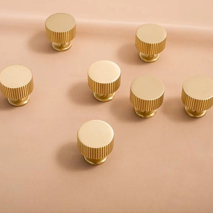 Fluted solid brass round cabinet knob in brushed brass