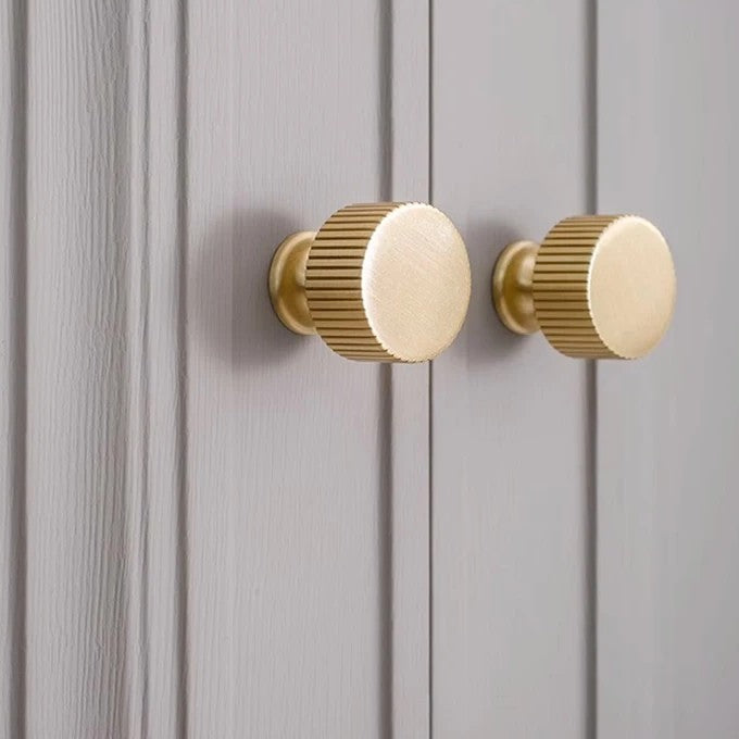 Fluted solid brass round cabinet knob in brushed brass