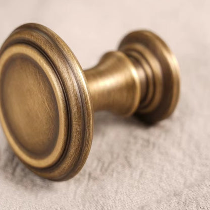 French spire solid brass round cabinet knob in antique brass