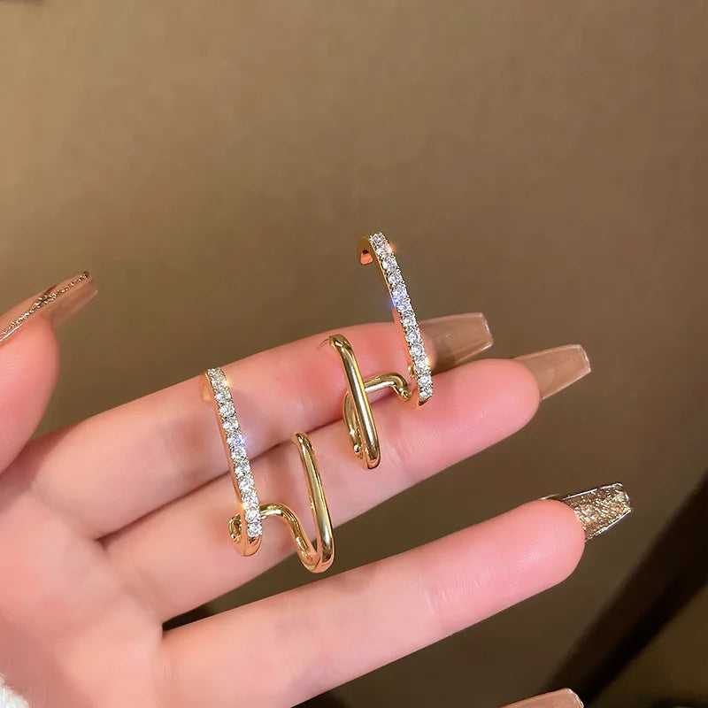 Geometric Double-Bar Moissanite Stud Earrings in Silver — Gold-tone pair on hand