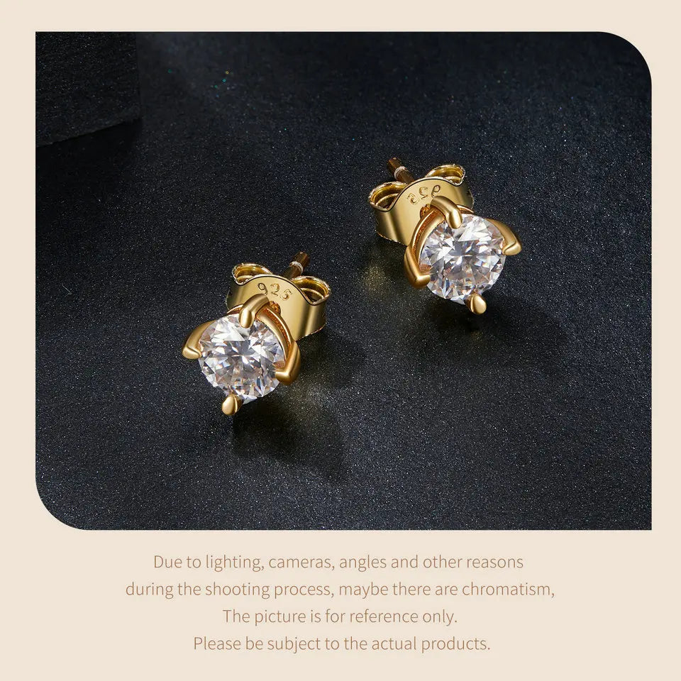 Round Moissanite Four-Prong Stud Earrings in Sterling Silver - Gold-tone pair close-up