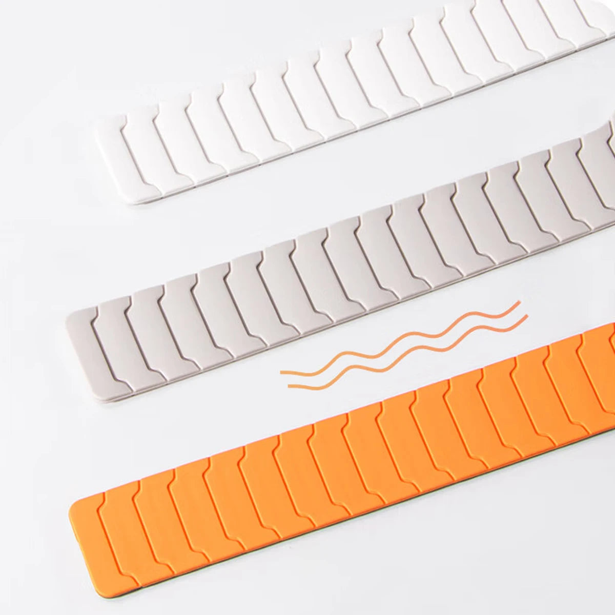 Three segmented silicone straps showing their surface details