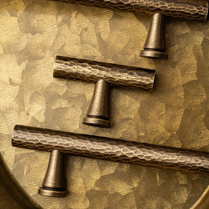 Hand-hammered solid brass cabinet pull in antique brass