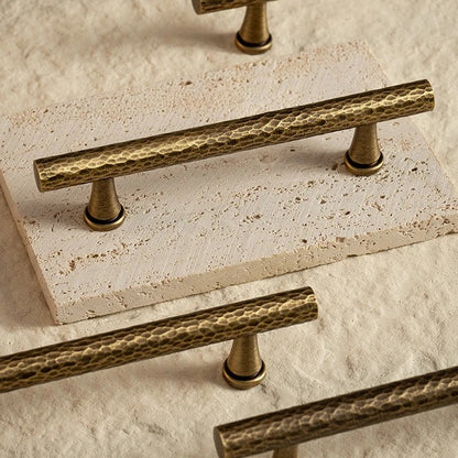 Hand-hammered solid brass T-bar cabinet knob in antique brass