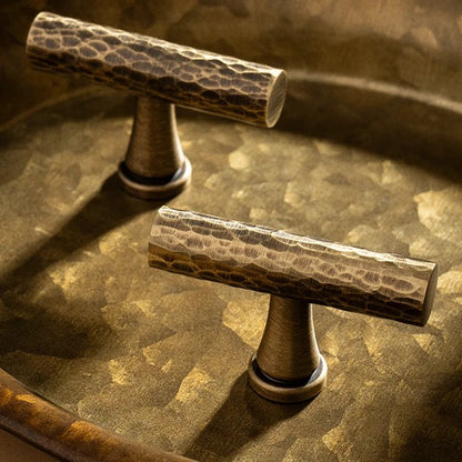 Hand-hammered solid brass T-bar cabinet knob in antique brass