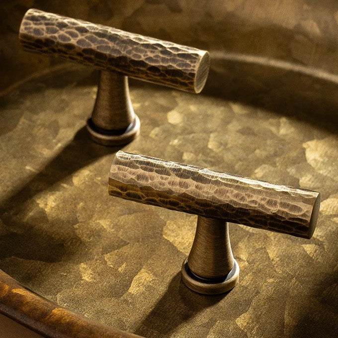 Hand-hammered solid brass T-bar cabinet knob in antique brass
