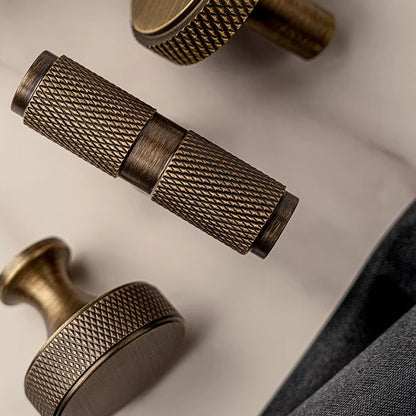 Knurled solid brass round and T-bar cabinet knobs in antique brass