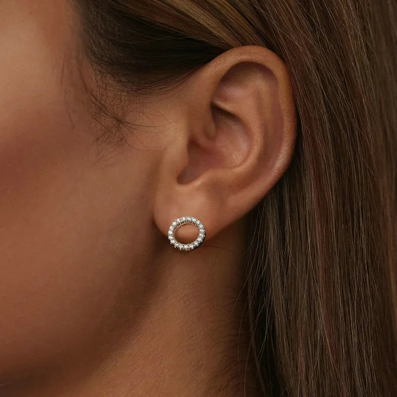 Open Circle Moissanite Stud Earrings in Sterling Silver — Sparkling circle worn on the ear