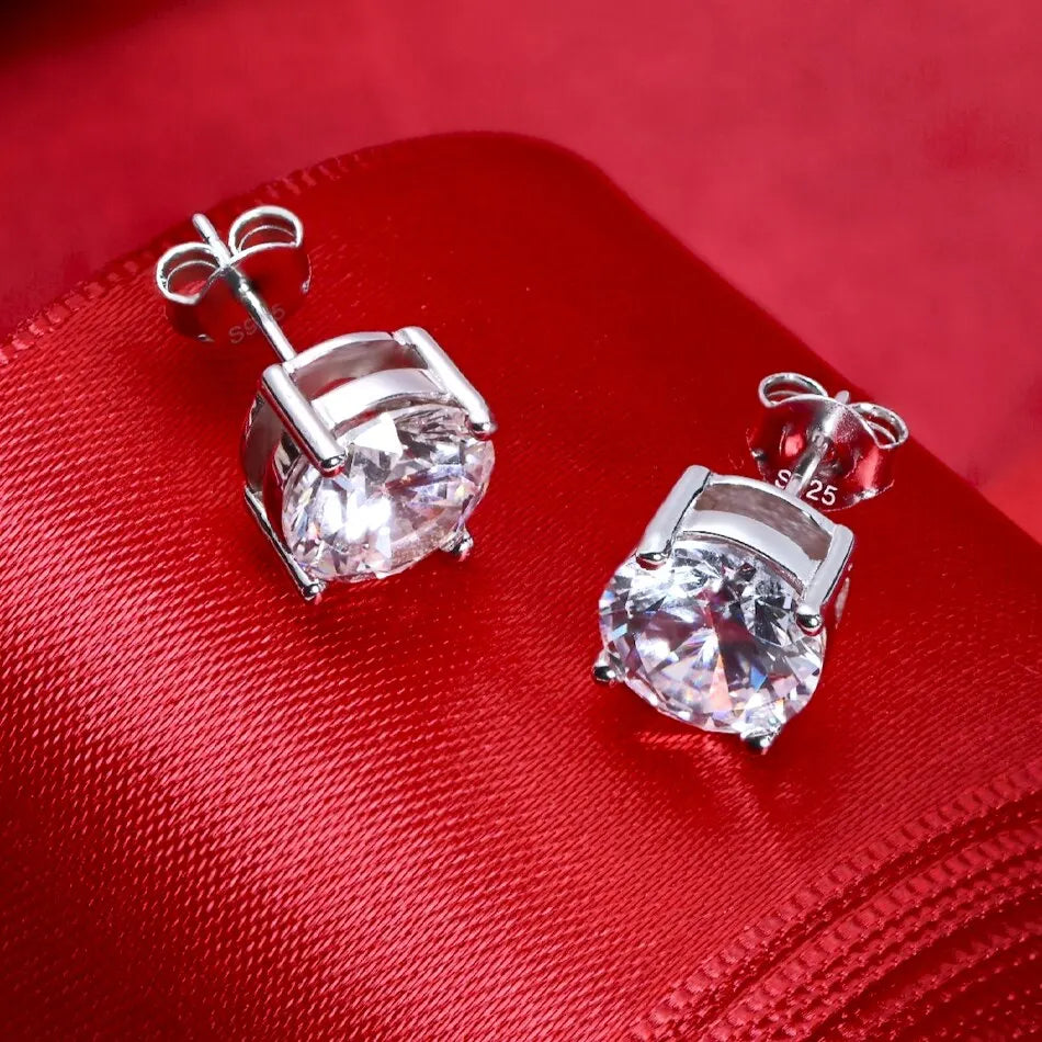 Round Four-Prong Moissanite Stud Earrings in Sterling Silver — Basket settings