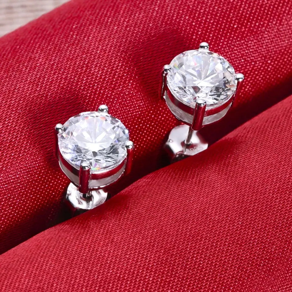 Round Four-Prong Moissanite Stud Earrings in Sterling Silver — Front pair