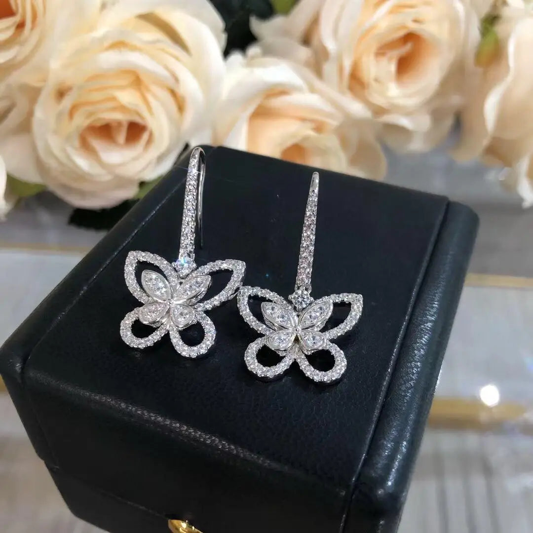 Openwork Butterfly Moissanite Drop Earrings in Silver — Butterfly pair on box