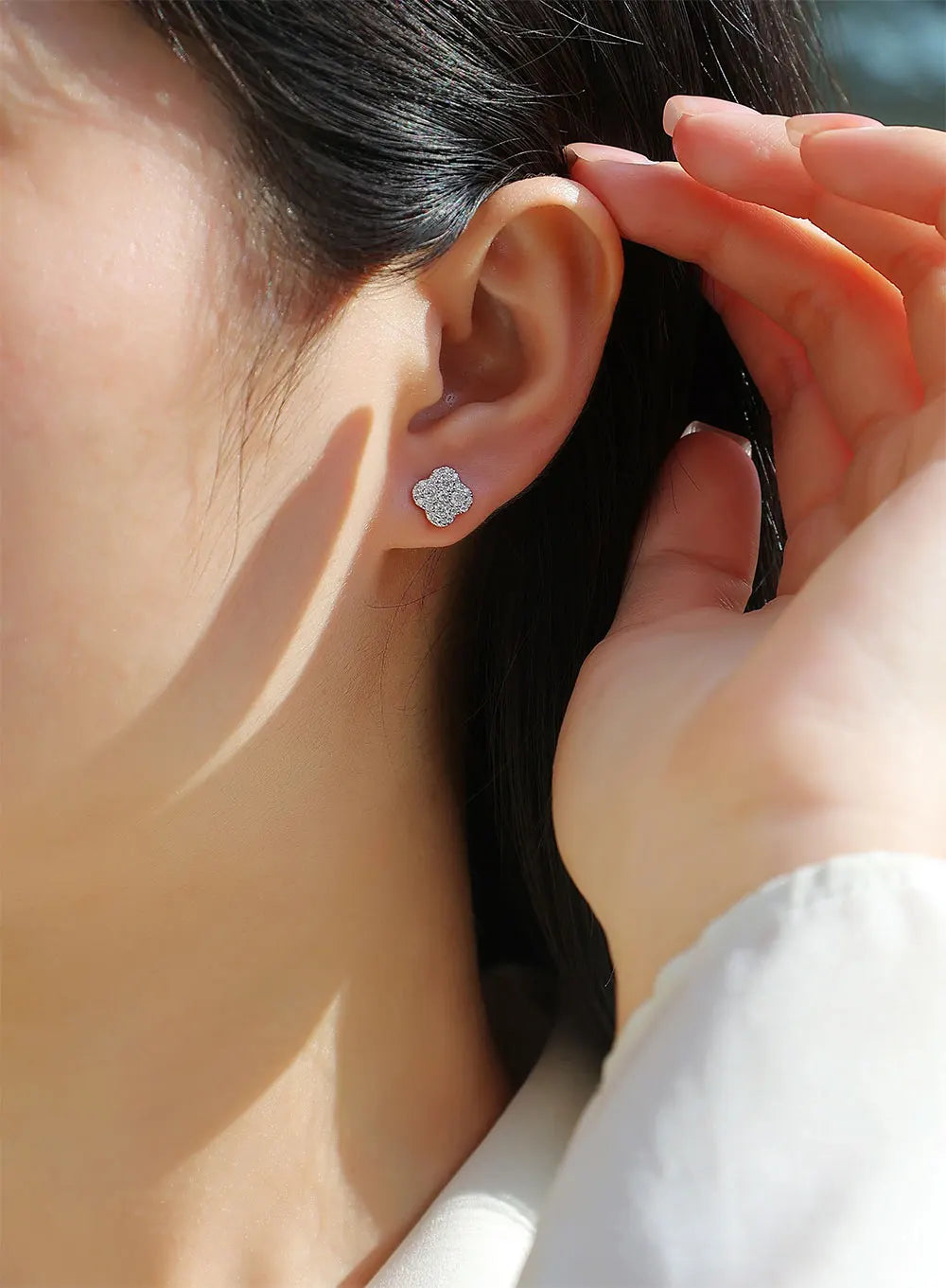 Clover Cluster Moissanite Stud Earrings in Sterling Silver — Clover studs styled on the ear