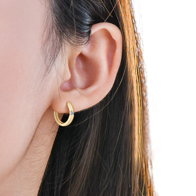 Minimalist Moissanite Hoop Earrings in Sterling Silver — Gold-Tone hoop worn on the ear