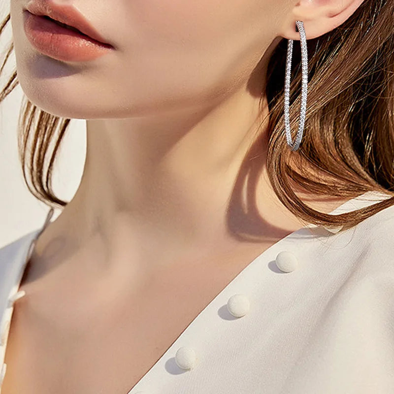 Moissanite Hoop Earrings in Sterling Silver - 30mm or 50mm — Moissanite hoops worn on ear — BandsCo Straps