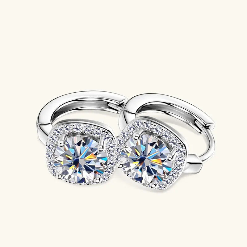 Cushion Halo Moissanite Huggie Earrings in Sterling Silver — Silver hoops, angled detail