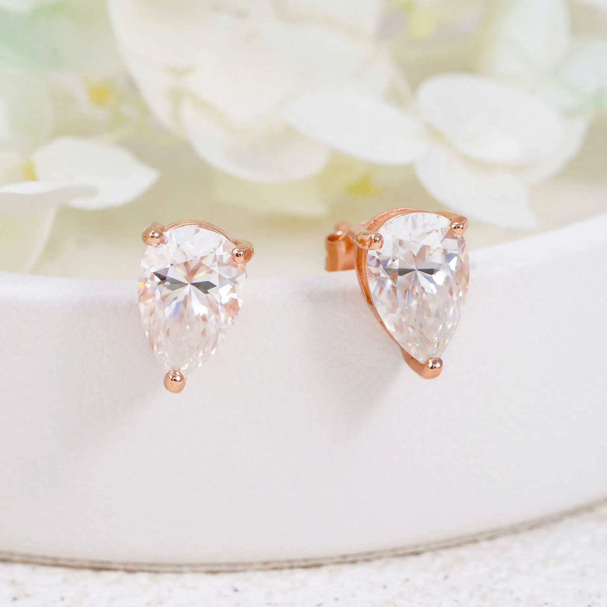 Pear Moissanite Solitaire Stud Earrings in Sterling Silver — Rose Gold Tone — BandsCo Straps
