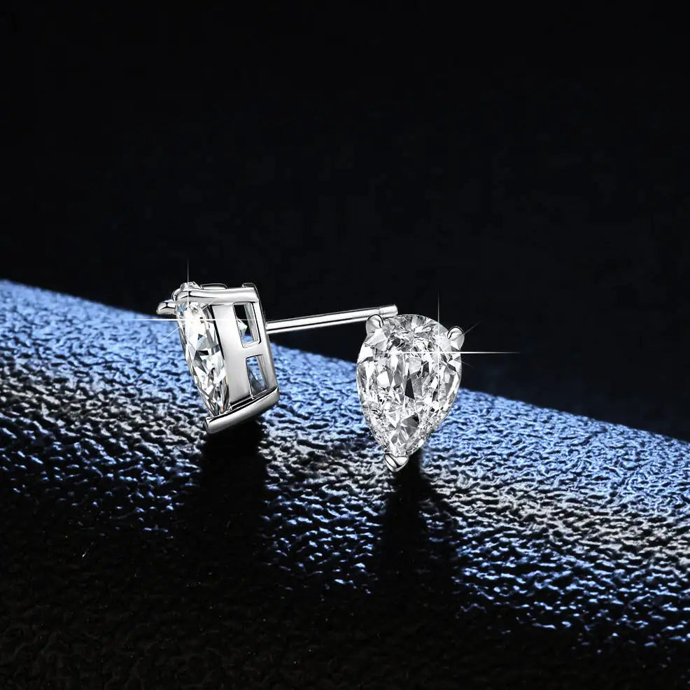 Pear Moissanite Solitaire Stud Earrings in Sterling Silver — Silver-tone pear stud side view — BandsCo Straps
