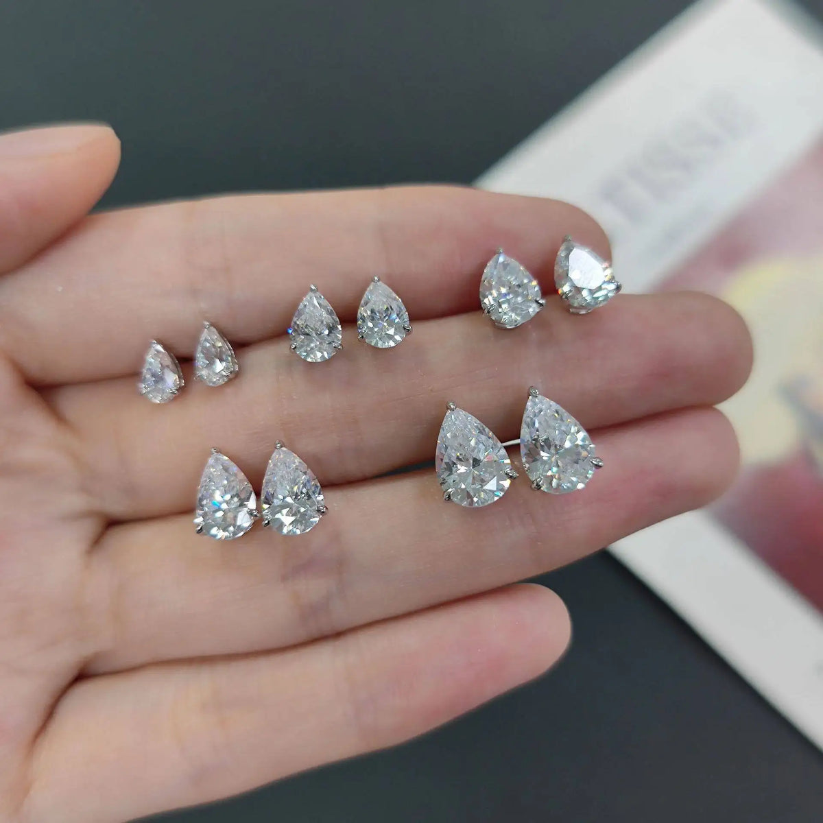 Pear Moissanite Solitaire Stud Earrings in Sterling Silver — Pear stone size comparison — BandsCo Straps