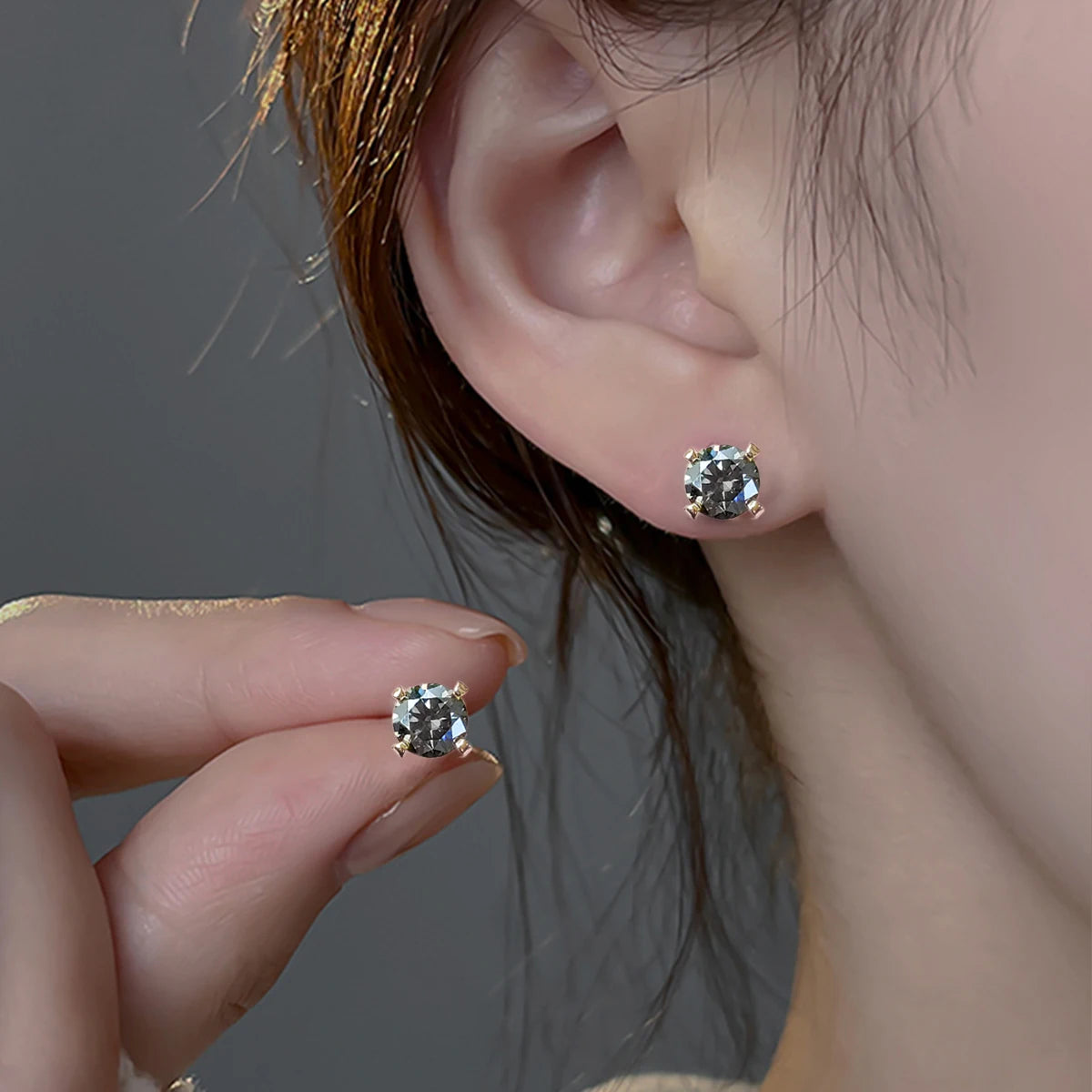 Gray Moissanite Solitaire Stud Earrings in Sterling Silver - Gray studs on model
