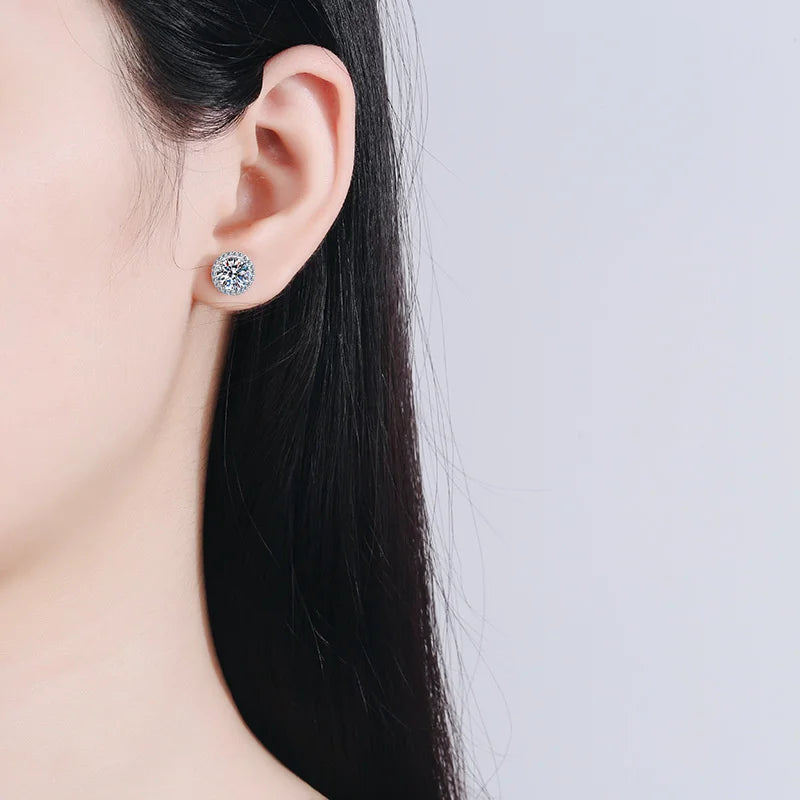 Colored Round Halo Moissanite Stud Earrings in Silver - Halo studs on model